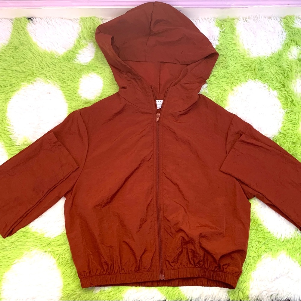 Orange windbreaker